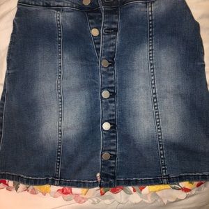 Jean skirt with flower pattern on the bottom